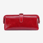 Cuirae red glossy genuine leather makeup bag with buckle closure, front view on white background