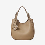 Cuirae taupe pebbled genuine leather bucket bag with silver hardware and top handle, front view on white background