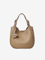 Cuirae taupe pebbled genuine leather bucket bag with silver hardware and top handle, front view on white background