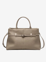 Cuirae taupe pebbled genuine leather handbag with belt buckle detail and silver hardware, front view on white background