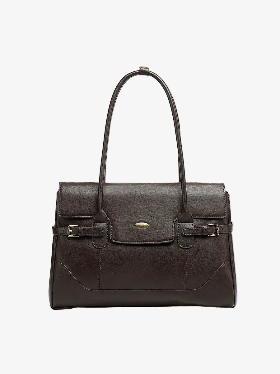 Cuirae chocolate top-grain leather everyday tote bag with top handles and gold hardware, front view on white background