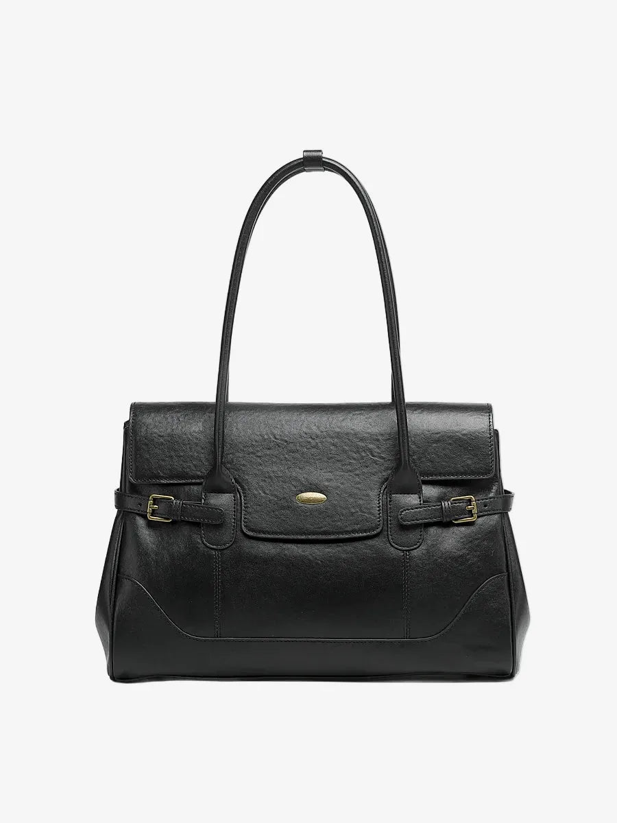 Cuirae gray top-grain leather everyday tote bag with top handles, angled side view showing structured silhouette on white background