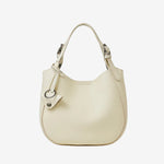 Cuirae twhite pebbled genuine leather bucket bag with silver hardware and top handle, front view on white background