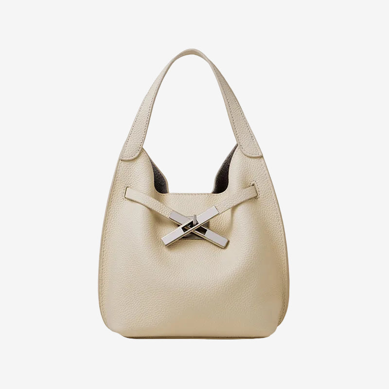 Cuirae white pebbled genuine leather hobo crossbody bag with silver cross turnlock hardware, front view on white background