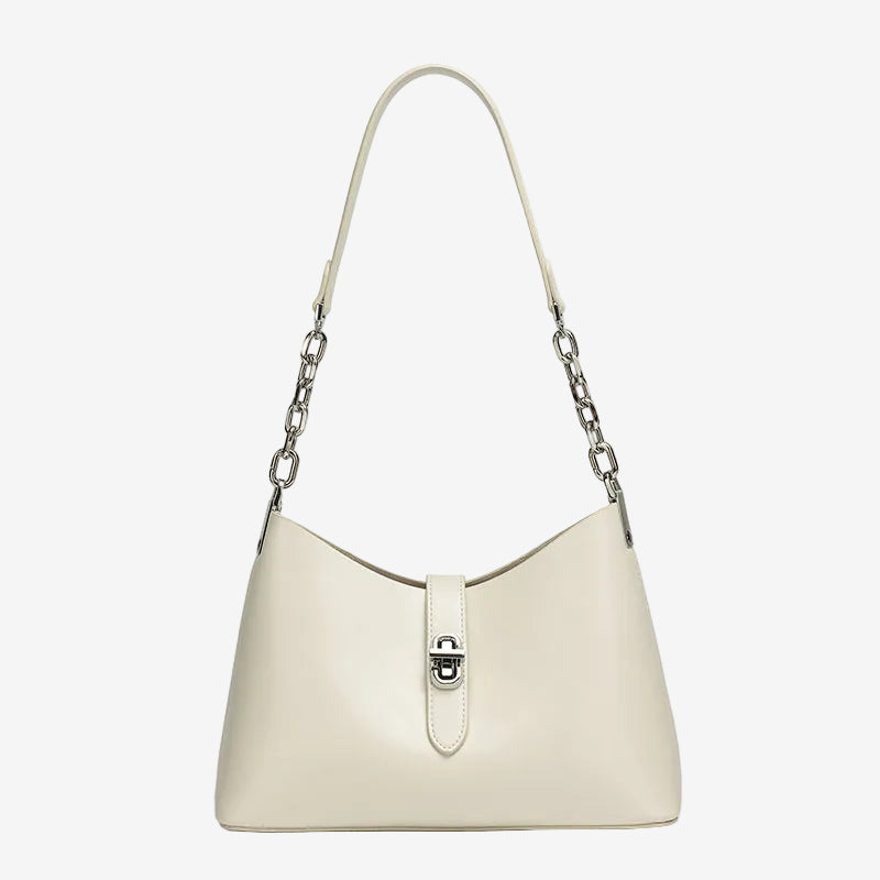 A front view of the Cuirae white top-grain cowhide handbag with a silver lock and chain strap on a white background.