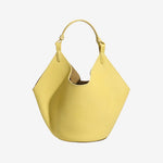 Cuirae yellow pebbled genuine leather soft slouchy hobo bucket bag, front view on white background with adjustable top handle
