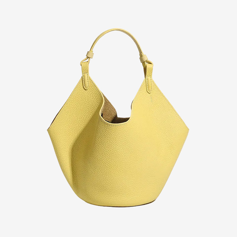 Cuirae yellow pebbled genuine leather soft slouchy hobo bucket bag, front view on white background with adjustable top handle