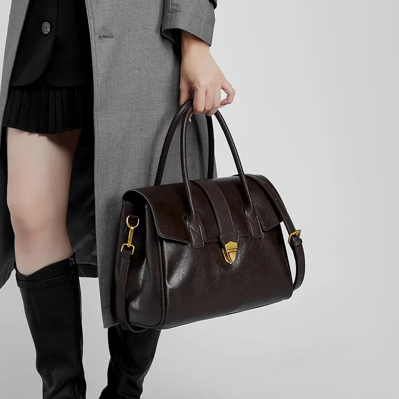 Cuirae lightweight full-grain leather travel tote with trolley sleeve, fits under airline seats