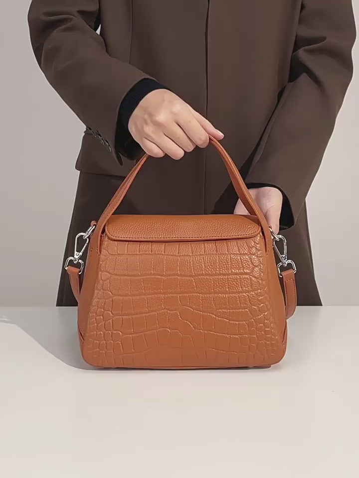 A dynamic showcase of the Cuirae genuine leather crossbody bag, highlighting its spacious interior, built-in pockets, and metal hardware details, as well as how the models demonstrate its versatility with various outfits.