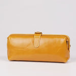A dynamic showcase of the Cuirae genuine leather makeup bag， close-up shots of the various colored makeup bags; individual shots of the brown storage bag, showing its exterior and interior space.
