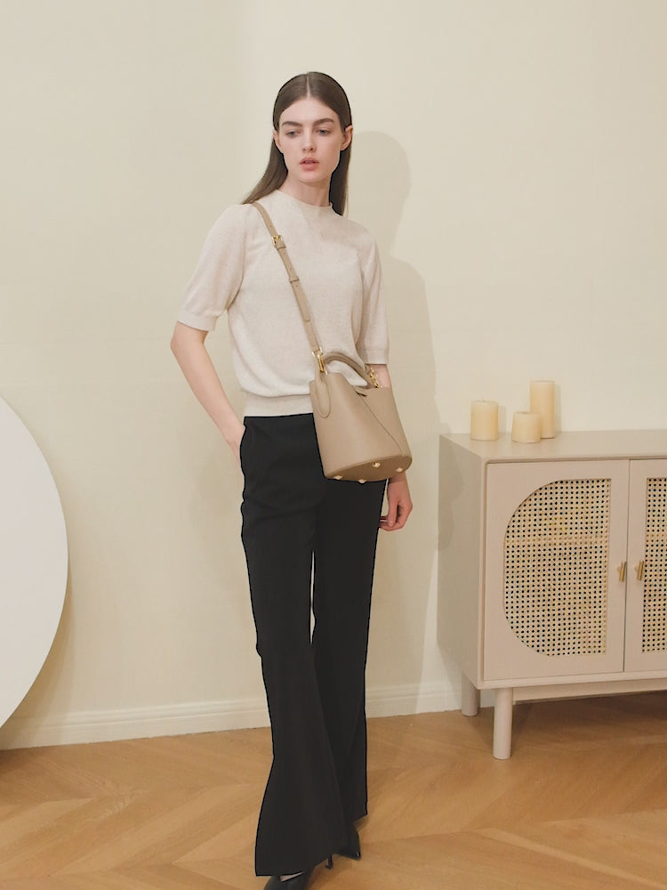 A dynamic showcase of the Cuirae genuine leather crossbody bag, highlighting its appearance up close and the details, as well as how the models demonstrate its versatility with various outfits.